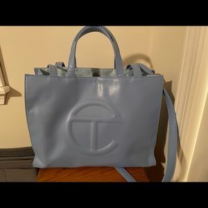 Telfar medium cerulean shopping bag. Gently used. Includes dustbag and organizer